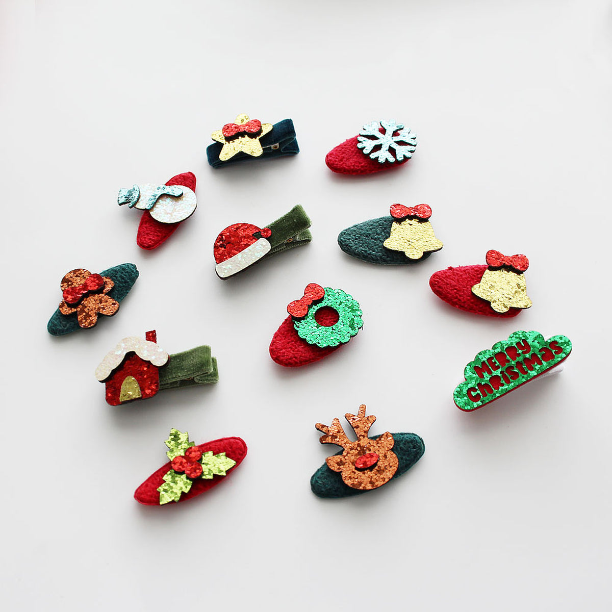 Glitter Christmas hair clips handmade sample flat lay